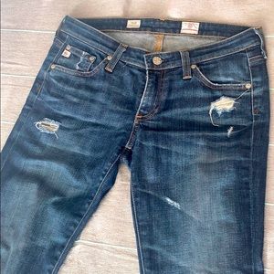 Worn in look straight leg jeans.